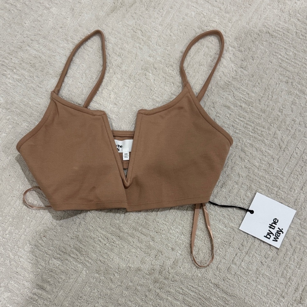 XXS brand new with tags by the way. Tan bralette